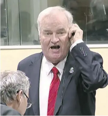  ?? ICTY VIA AP ?? Former Bosnian Serb military chief Ratko Mladic shouts during the Yugoslav War Crimes Tribunal in The Hague, Netherland­s, Wednesday. Mladic, the “Butcher of Bosnia,” was found guilty of genocide and crimes against humanity.
