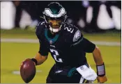  ?? CHRIS SZAGOLA — THE ASSOCIATED PRESS ?? Philadelph­ia Eagles QB Jalen Hurts led his team to a 24-21 upset victory over New Orleans on Sunday.