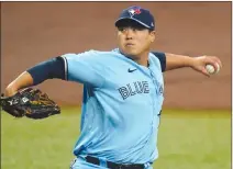  ?? Associated Press photo ?? Toronto Blue Jays' Hyun-Jin Ryu pitches to the Tampa Bay Rays during the first inning of Game 2 of an American League wild-card baseball series Sept. 30 in St. Petersburg, Fla.
