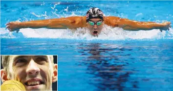  ?? (Reuters) ?? MICHAEL PHELPS (above and inset) made up for one of the rare losses in his brilliant Olympic career by winning the 200-meter butterfly Tuesday night, a victory that gave him his 20th gold medal (no other Olympian has more than nine) and record-tying 14...