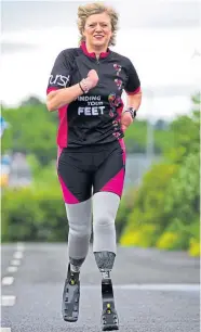  ??  ?? ● Corinne, seen in 2017 training for the London Triathlon, is back pounding the streets ahead of the Meadows Marathon