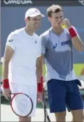  ?? RYAN REMIORZ, THE CANADIAN PRESS ?? Daniel Nestor, left, and his doubles partner Vasek Pospisil in 2016.