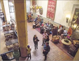  ?? Photograph­s by Ricardo DeAratanha ?? THE FADING
Hotel Figueroa, recently a low-budget inn, will get a $30-million renovation.