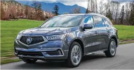  ?? Acura photos ?? The 2017 Acura MDX Sport Hybrid uses the same basic powertrain as the NSX, though not as powerful. Total system horsepower is 321, with 289 lb.-ft. of torque. Its fuel economy works out to 26/27/27 mpg.