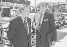  ?? Steve Gonzales / Houston Chronicle ?? Jason Posey, left, former Rep. Steve Stockman’s aide, chats with his attorney Phil Hilder before entering the Bob Casey Federal Courthouse on Wednesday to plead guilty.