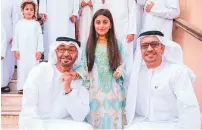  ?? Courtesy: Twitter ?? Shaikh Mohammad Bin Zayed with Aisha and her family during a visit to her home yesterday.