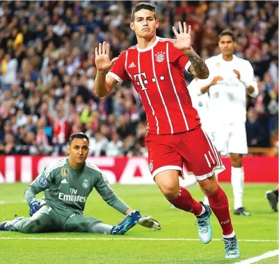  ?? KAI PFFAFFENBA­CH/REUTERS ?? INCAR DOBEL: James Rodriguez setelah membobol gawang Real Madrid (1/5). James berpeluang meraih double winners dini hari nanti.