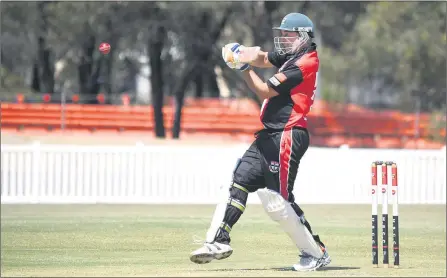  ?? Picture: PAUL CARRACHER ?? FOUR: Saints veteran Gary Davidson smacks a four at Coughlin Park, Horsham, during his team’s clash against Jung Tigers in B Grade action on Saturday.