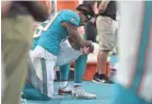  ?? JASEN VINLOVE/USA TODAY ?? Dolphins wide receiver Kenny Stills kneels during the national anthem at a game Aug. 25.