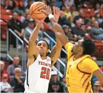  ?? BRAD TOLLEFSON/AP ?? Texas Tech’s Jaylon Tyson shoots the ball over Iowa State’s Osun Osunniyi during Monday night’s game in Lubbock, Texas.