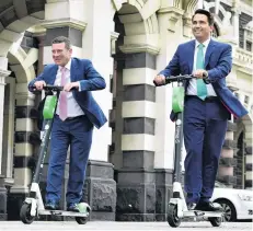  ?? PHOTO: PETER MCINTOSH ?? In happier times . . . Deposed National Party leader Simon Bridges (right) with Michael Woodhouse go for a ride in Dunedin last year.