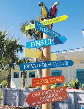  ??  ?? Jimmy Buffett fans are flocking to buy homes in his new active-adult community in Daytona Beach, Fla., where you can live on Flip Flop Court, Coral Reef Way or St. Somewhere Drive.