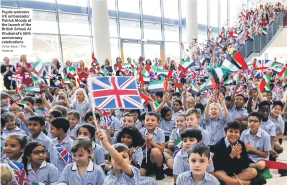  ?? Victor Besa / The National ?? Pupils welcome UK ambassador Patrick Moody at the launch of the British School Al Khubairat’s 50th anniversar­y celebratio­ns