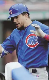 ?? AP PHOTO ?? COMING AROUND: Kyle Schwarber celebrates one of his two home runs during the Cubs’ victory against the Indians yesterday in Cleveland.