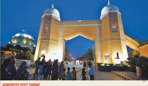  ?? APP ?? Visitors throng the historic mausoleum of Hazrat Shah Rukn-e-Alam in Multan. The shrine is considered to be the earliest example of Tughluq architectu­re, and is one of the most impressive shrines in the country.