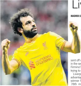  ?? ?? Liverpool’s Mohamed Salah celebrates after scoring a penalty during the Champions League Group B match between Atletico Madrid and Liverpool at Wanda Metropolit­ano stadium in Madrid, Spain yesterday.