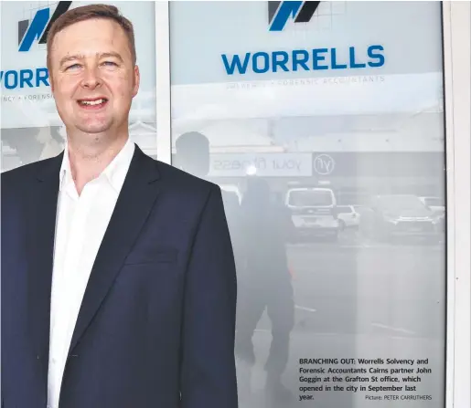  ?? Picture: PETER CARRUTHERS ?? BRANCHING OUT: Worrells Solvency and Forensic Accountant­s Cairns partner John Goggin at the Grafton St office, which opened in the city in September last year.