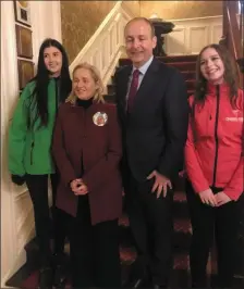  ?? Mr Martin with Cllr Norma Moriarty and members of her canvass team in Killarney’s Internatio­nal Hotel on Saturday. Photo Facebook ??