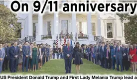  ??  ?? US President Donald Trump and First Lady Melania Trump lead a moment of silence in remembranc­e of those who died in the Sept. 11, 2001 terrorist attacks at the White House in Washington on Monday.