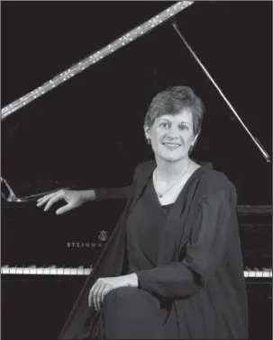  ?? Submitted photo ?? RECITAL: Linda Holzer, professor of piano at the University of Arkansas at Little Rock, will present a piano recital at 3 p.m. Sunday in the sanctuary at Holy Trinity Episcopal Church, 199 Barcelona Road, Hot Springs Village. A slideshow in the...