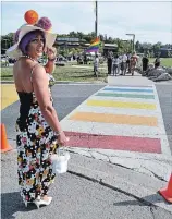  ?? JOELLE KOVACH/EXAMINER ?? Performer Ms. Madge Enthat was on hand for the opening of the new rainbow crosswalk at Fleming College’s Sutherland Campus on Friday.