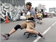  ?? PICTURE: REUTERS ?? Competitor­s take part in the office chair race ISU-1 Grand Prix in Tainan, in southern Taiwan, earlier this week.