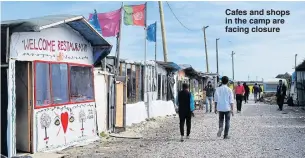  ??  ?? Cafes and shops in the camp are facing closure