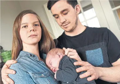  ?? SUSIE KOCKERSCHE­IDT/METROLAND ?? Kyra Barkey, with daughter Evelyn, and husband, Ryan. Kyra had a close call with strep A after giving birth in Markham.