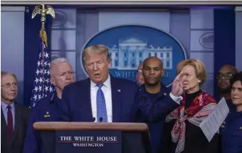  ?? GETTY IMAGES ?? ‘JUST RELAX’: President Trump speaks to the media on Sunday about the coronaviru­s. Top right, a shopper walks past empty shelves in a Hub supermarke­t.