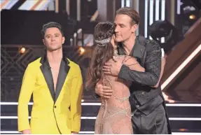  ?? ERIC MCCANDLESS/ABC ?? James Van Der Beek hugs his partner Emma Slater on “Dancing With the Stars.”