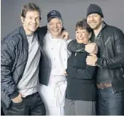  ??  ?? (left to right) Wahlburger­s is co-owned by actor Mark Wahlberg, executive chef Paul Wahlberg, mother Alma Wahlberg and Donnie Wahlberg (of New Kids on the Block fame). The burger chain was also featured in an A&E Network reality TV show for 10 seasons.