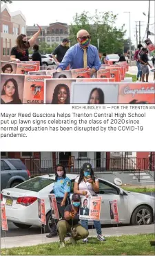  ?? RICH HUNDLEY III — FOR THE TRENTONIAN ?? Mayor Reed Gusciora helps Trenton Central High School put up lawn signs celebratin­g the class of 2020since normal graduation has been disrupted by the COVID-19 pandemic.