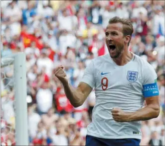  ?? ANTONIO CALANNI — THE ASSOCIATED PRESS ?? England’s Harry Kane celebrates after he scored his side’s second goal during the group G match between England and Panama at the 2018 soccer World Cup at the Nizhny Novgorod Stadium in Nizhny Novgorod, Russia, Sunday.