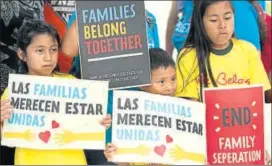  ?? AP FILE ?? Children protest in front of an Immigratio­n and Customs Enforcemen­t office in Florida.