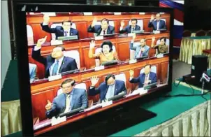  ?? PHA LINA ?? Lawmakers vote during a National Assembly session earlier this year. An opinion piece published by Fresh News suggests that the opposition party’s possible dissolutio­n would lead to assembly seats being redistribu­ted to smaller political parties.