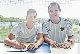  ?? Prensa boca ?? Merentiel, que puso la firma en Boca, y Delgado