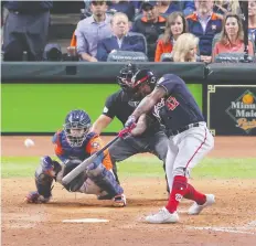  ?? ERIK WILLIAMS/USA TODAY SPORTS ?? Nationals designated hitter Howie Kendrick uncorks a two-run blast in the top of the seventh inning to put Washington ahead 3-2 in Game 7 of the World Series. The Nationals unleashed a late offensive outburst to win the Fall Classic.