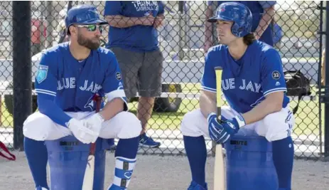  ?? FRANK GUNN/THE CANADIAN PRESS ?? New Jays outfielder Randal Grichuk, right, isn’t likely to match Kevin Pillar on the basepaths, but the former Cardinal could surprise.