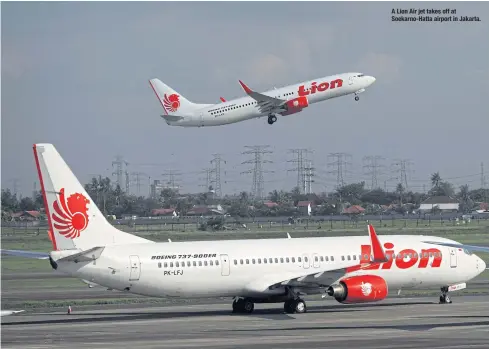  ??  ?? A Lion Air jet takes off at Soekarno-Hatta airport in Jakarta.