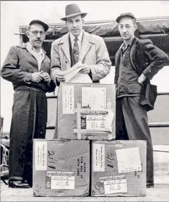  ?? Knickerboc­ker News Staff Photo / Times Union Historic Images ?? The first commercial shipment of Salk polio vaccine to the area arrives at the Albany airport on April 13, 1955. It was bound for Parke Davis & Company in Menands and from there was to be distribute­d to local druggists and physicians.