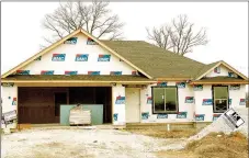  ?? LYNN KUTTER ENTERPRISE-LEADER ?? Several houses are under constructi­on in Battlefiel­d Estates in Prairie Grove, including this one on Sebastian Lane. Prairie Grove set a new record for housing starts in 2016.