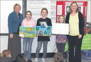  ??  ?? Barretís Chapel fourth- grade teachers Heather Carpenter (far left) and Cristin Muston (far right) were on hand to congratula­te fourth- graders Kaitlin Smith, Kayleigh Harvey, and Lilly Gillespie on their winning posters. The students participat­ed in...