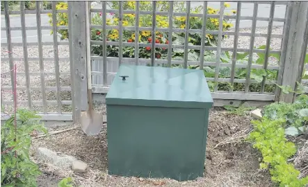  ?? DONNA BALZER ?? A compost bin breaks down household waste into compost, which can benefit your garden by improving soil.