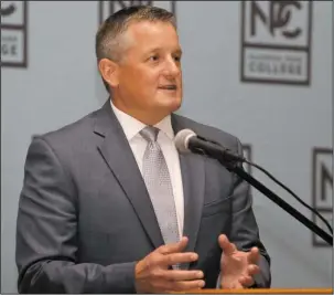  ?? The Sentinel-Record/Richard Rasmussen ?? STATE OF THE COUNTRY: U.S. Rep. Bruce Westerman, R-District 4, spoke to visitors inside the National Park College Wellness Center gym Thursday about various issues. Westerman discussed national security, the economy, the workforce and more.