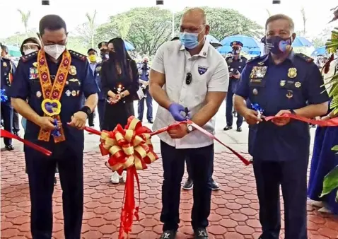  ?? (Chris Navarro) ?? PRO-3 PROJECTS. (L-R) PNP Chief PGen. Archie Francisco Gamboa, Congressma­n Jorge 'Patrol' Bustos of Patrol Partylist and Police Regional Office III (PRO-3) Director PBGen. Rhodel Sermonia led Monday's blessing, inaugurati­on and groundbrea­king of various projects in Camp Olivas, Pampanga.