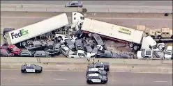  ?? REUTERS ?? Mangled cars and trucks are seen wedged together after a deadly pile-up in Fort Worth, Texas.
