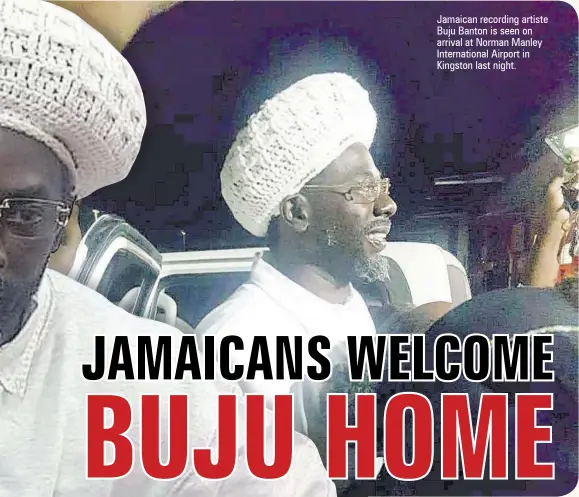  ??  ?? Jamaican recording artiste Buju Banton is seen on arrival at Norman Manley Internatio­nal Airport in Kingston last night.