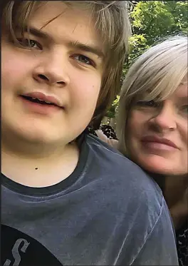  ??  ?? ‘BIG TEDDY BEAR’: Teenager Matthew Johnson with his mother Linda