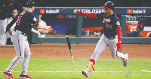  ?? TIM WARNER/GETTY IMAGES ?? Fans should welcome expression­s of raw emotion like Nationals slugger Juan Soto carrying his bat to first base after hitting a home run, writes Scott Stinson.