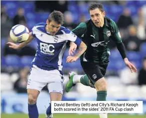  ??  ?? David Bentley (left) and City’s Richard Keogh both scored in the sides’ 2011 FA Cup clash